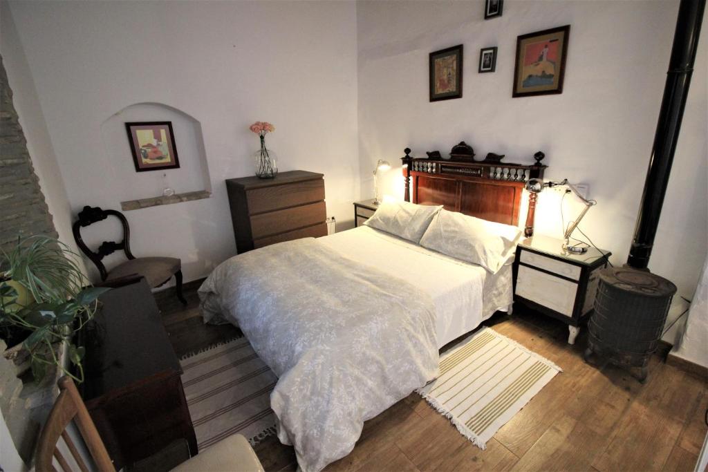 Postel nebo postele na pokoji v ubytování La Guarida de Vejer Casa Rural