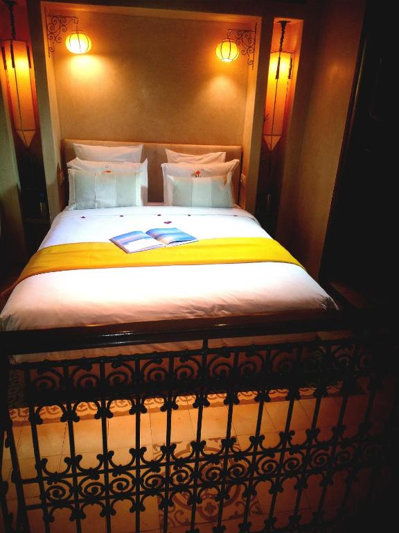 Postel nebo postele na pokoji v ubytování Riad Kalaa