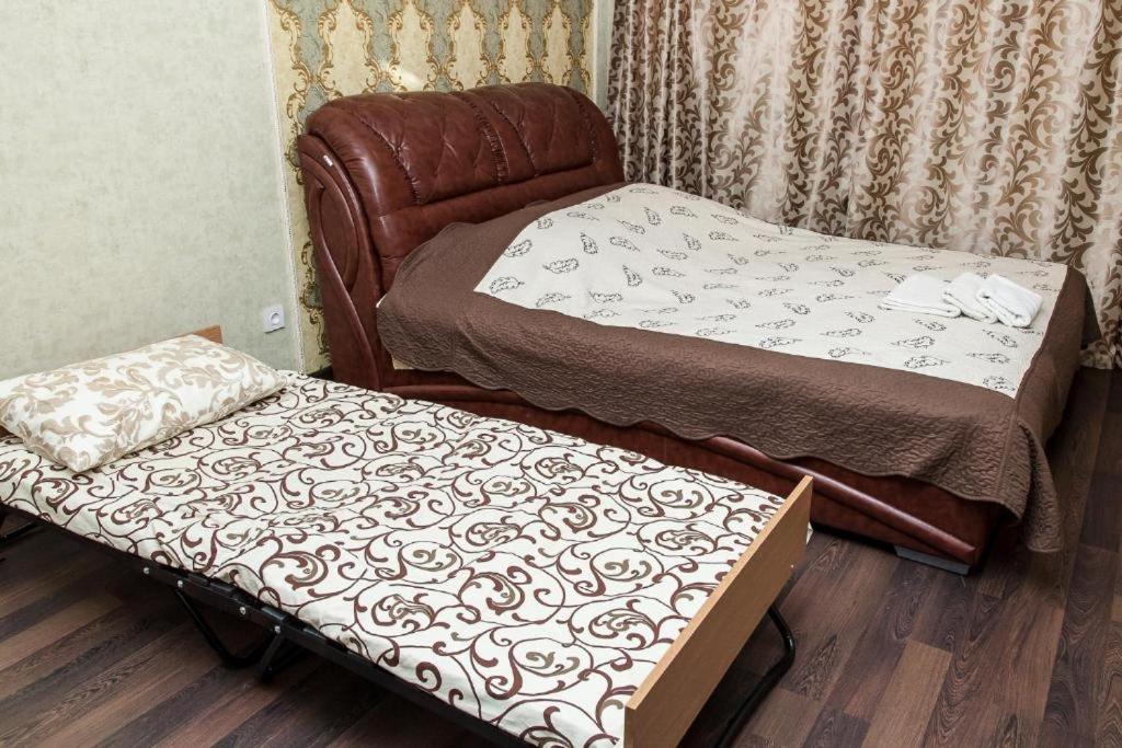Postel nebo postele na pokoji v ubytování Chyhorinskyi Hotel