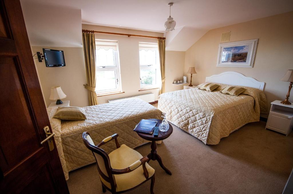 Postel nebo postele na pokoji v ubytování Seashore B&B