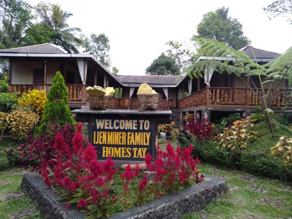 a welcome sign in front of a house at Ijen Miner Family Homestay in Banyuwangi