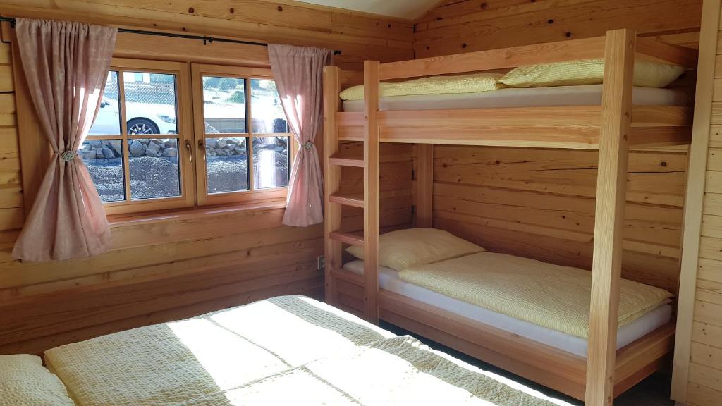 Postel nebo postele na pokoji v ubytování Apartmány Plešivec