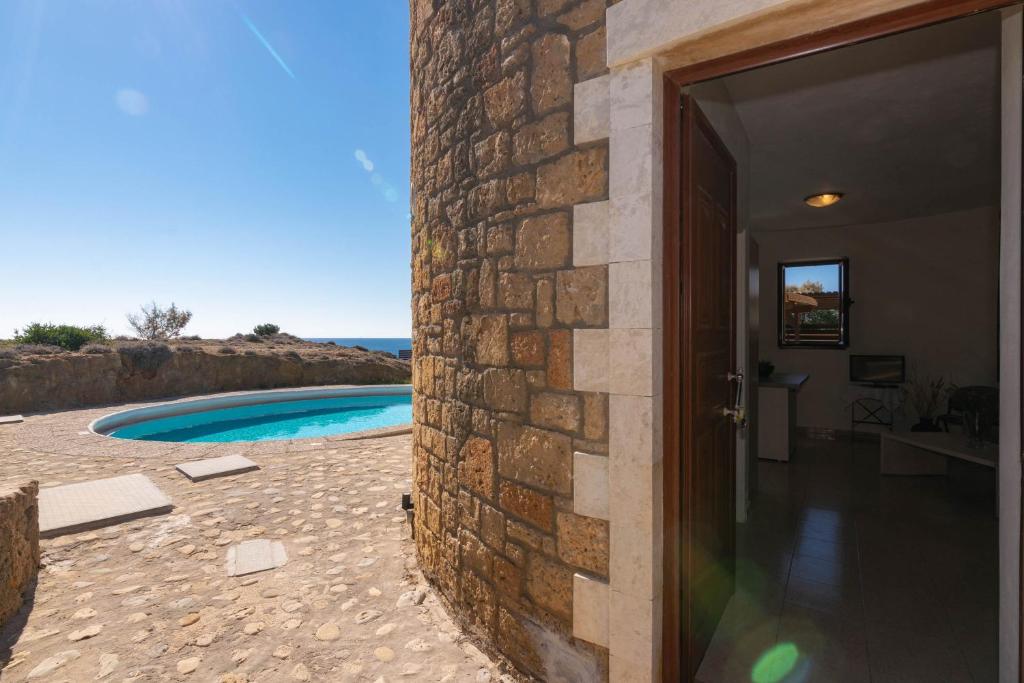 Bazén v ubytování Armonia Seaside Villas nebo v jeho okolí