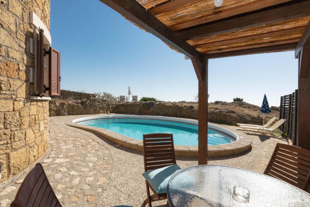 Bazén v ubytování Armonia Seaside Villas nebo v jeho okolí