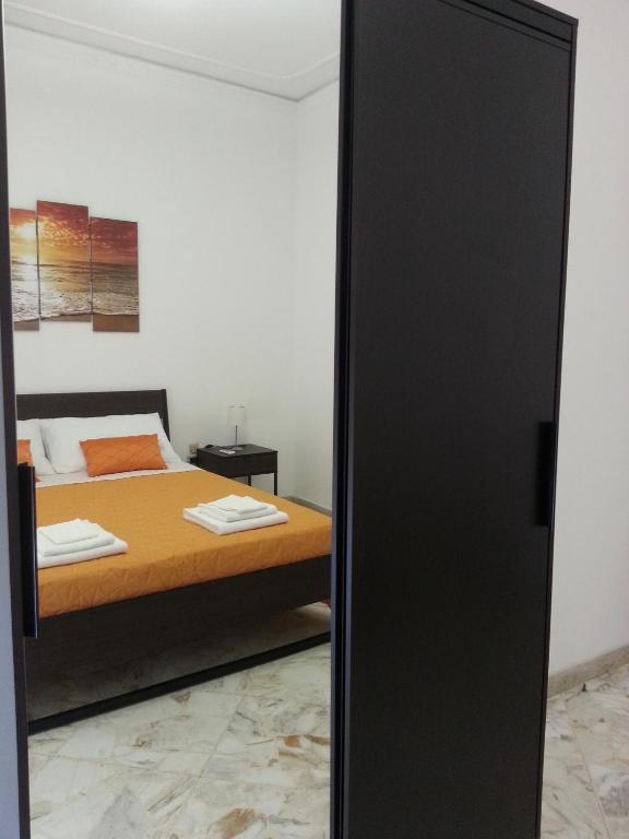 Posteľ alebo postele v izbe v ubytovaní La Via del Mare - Acireale Centro storico