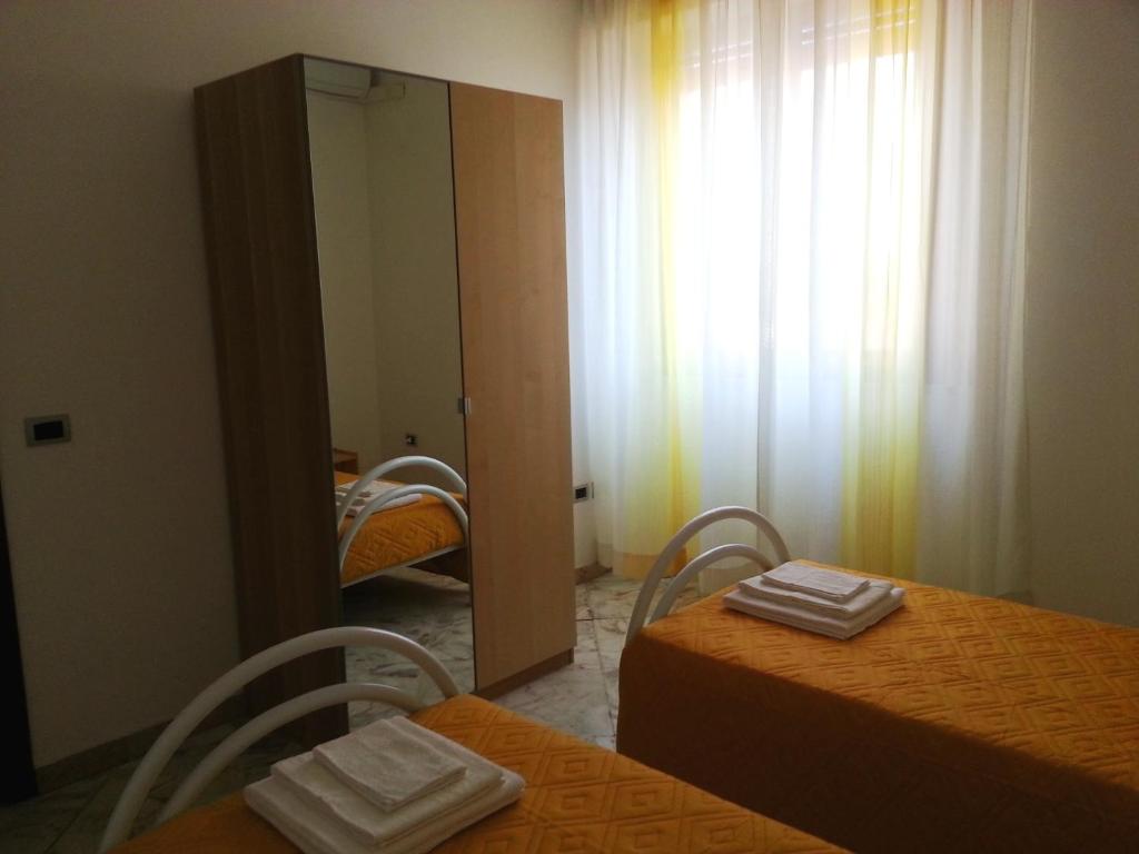 Posteľ alebo postele v izbe v ubytovaní La Via del Mare - Acireale Centro storico