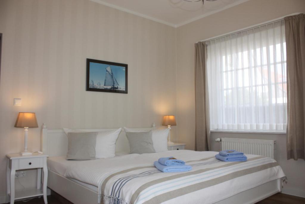 Postel nebo postele na pokoji v ubytování Hotel Maria