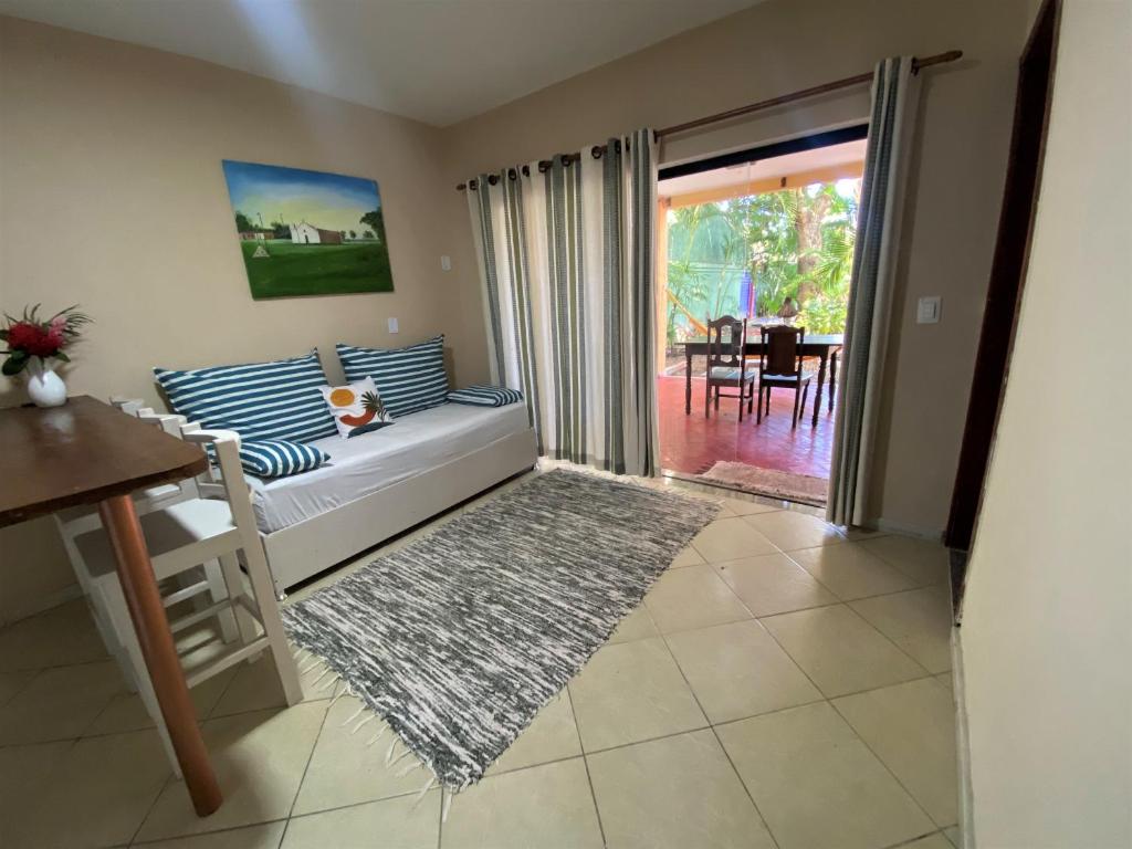 Postel nebo postele na pokoji v ubytování Ouro Sobre Azul Apart Hotel
