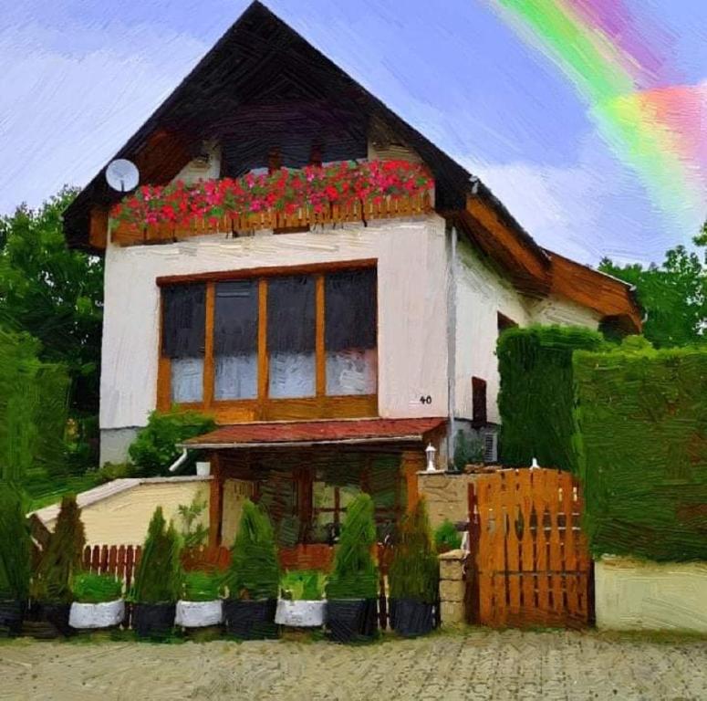 a painting of a house with flowers on top of it at Szivárvány Vendégház in Vértestolna