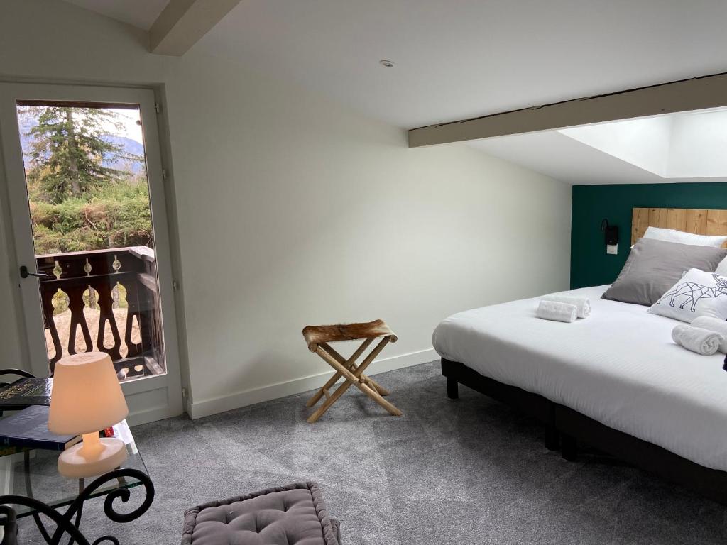 Postel nebo postele na pokoji v ubytování Chalet Pleine Vue & Spa