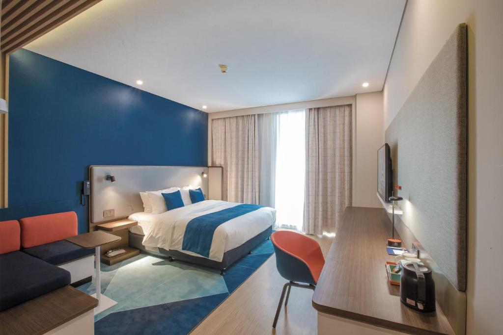 Postel nebo postele na pokoji v ubytování Holiday Inn Express Hefei High Tech by IHG