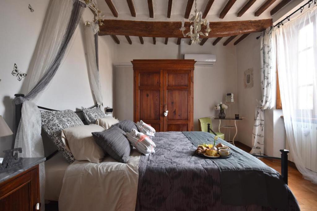 Postel nebo postele na pokoji v ubytování Il Giglio B&B