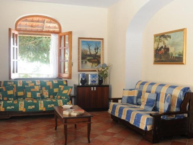 A seating area at VILLA PIETRALTA