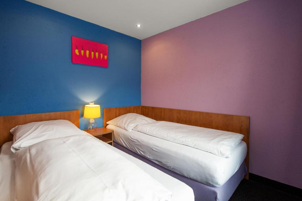 Postel nebo postele na pokoji v ubytování SmartHotel Flamingo Self check-in