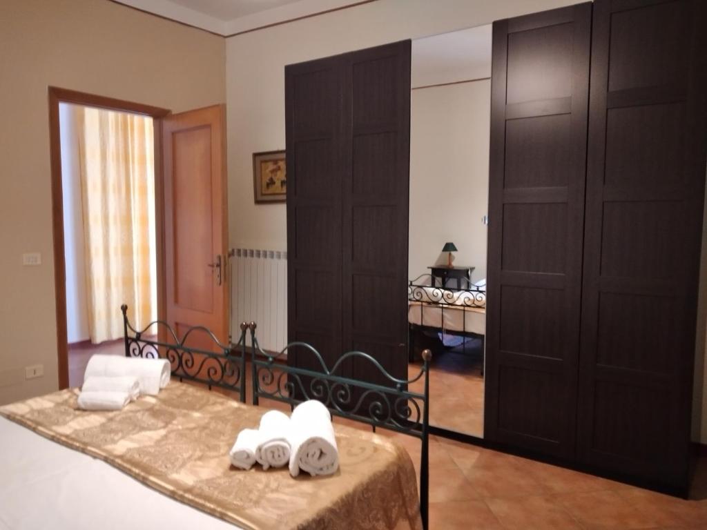 A bed or beds in a room at VILLA PIETRALTA