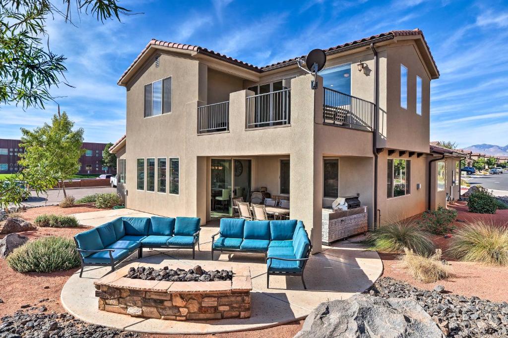 a house with a fire pit in the yard at Utah Home with Pool and Hot Tub Access, Mtn Views! in Santa Clara