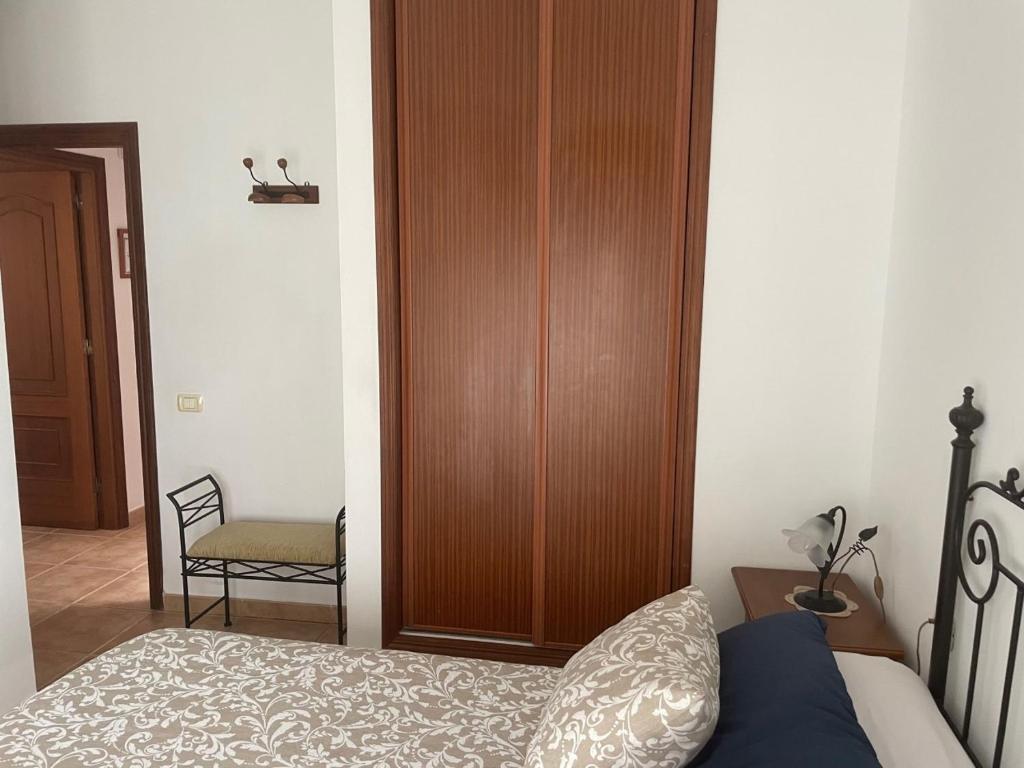 Postel nebo postele na pokoji v ubytování El Hoyo