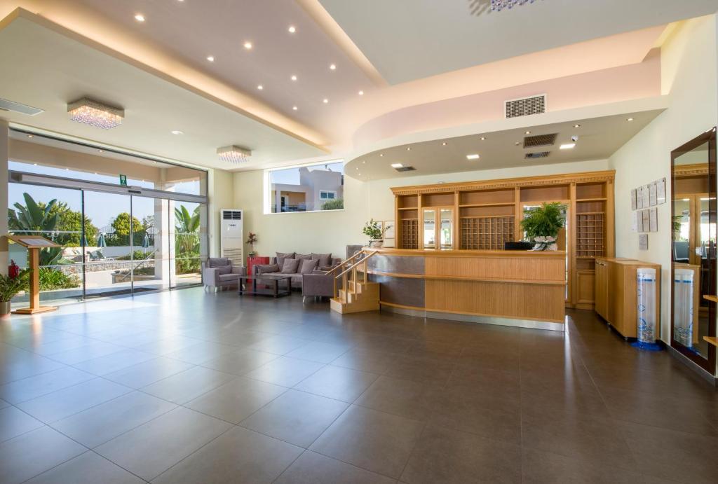 an empty lobby of a hospital with a waiting room at Isida Hotel Agia Marina in Agia Marina Nea Kydonias