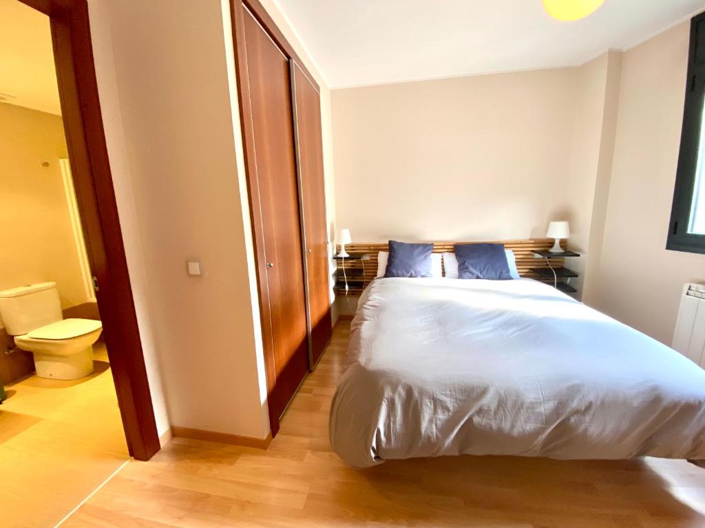 Postel nebo postele na pokoji v ubytování Solana del Tarter 333