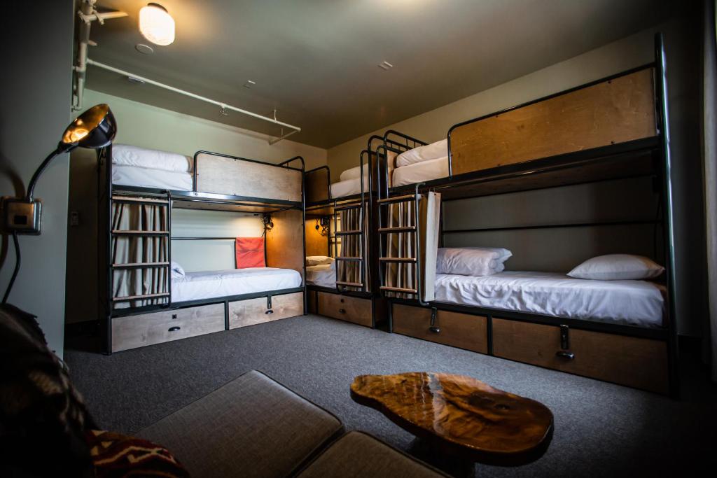 Postel nebo postele na pokoji v ubytování KEX Hotel