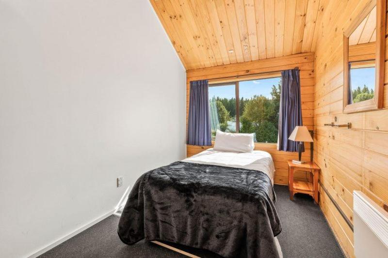 Postel nebo postele na pokoji v ubytování Altamont Lodge