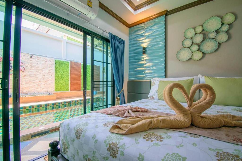 Letto o letti in una camera di TC villa on beach
