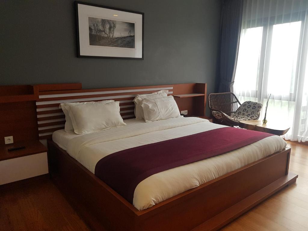 Postel nebo postele na pokoji v ubytování Jiwa Jawa Resort Bromo