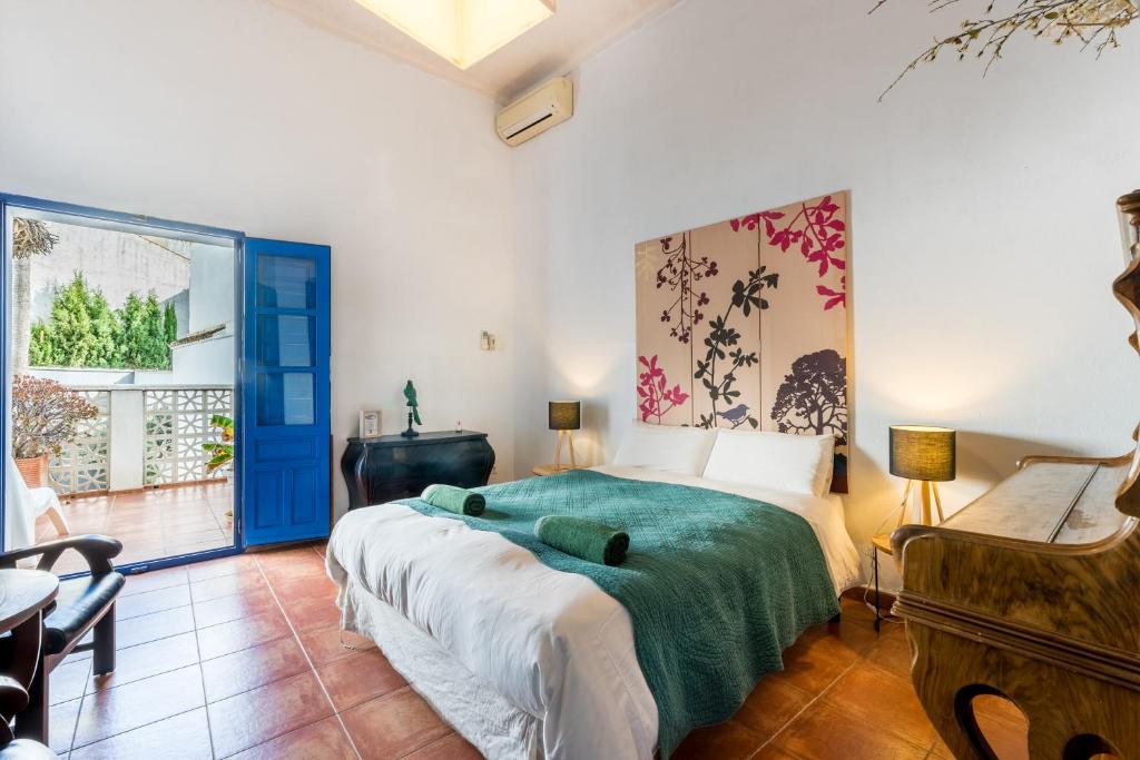 Postel nebo postele na pokoji v ubytování El Patio Andaluz