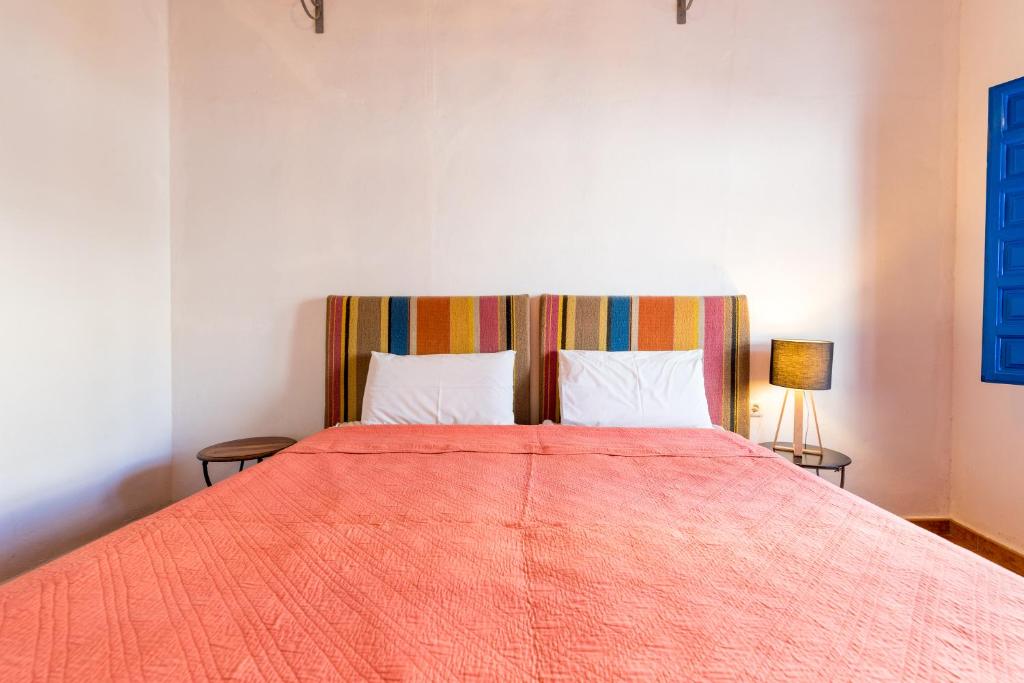 Postel nebo postele na pokoji v ubytování El Patio Andaluz