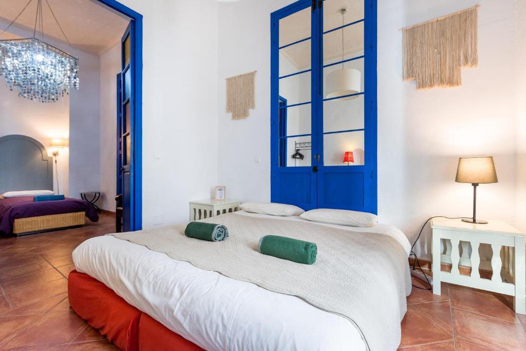 Postel nebo postele na pokoji v ubytování El Patio Andaluz