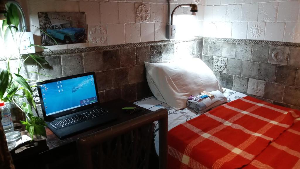 Postel nebo postele na pokoji v ubytování Casa Jazz