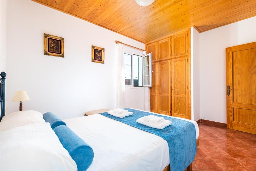 Postel nebo postele na pokoji v ubytování Villa Xiscu by Mauter Villas