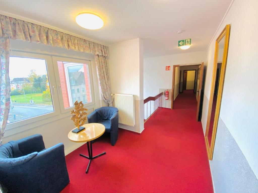 Posezení v ubytování Hotel Grimm