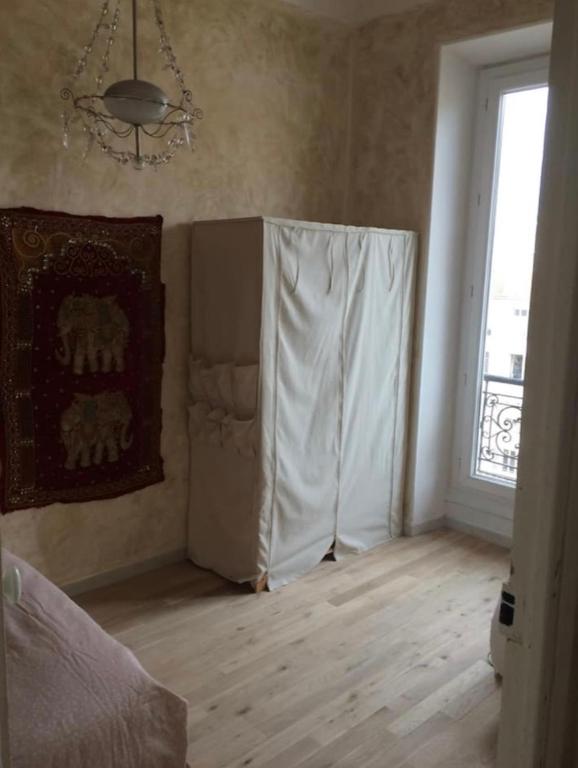 Postel nebo postele na pokoji v ubytování Great and light private room in the heart of Nice