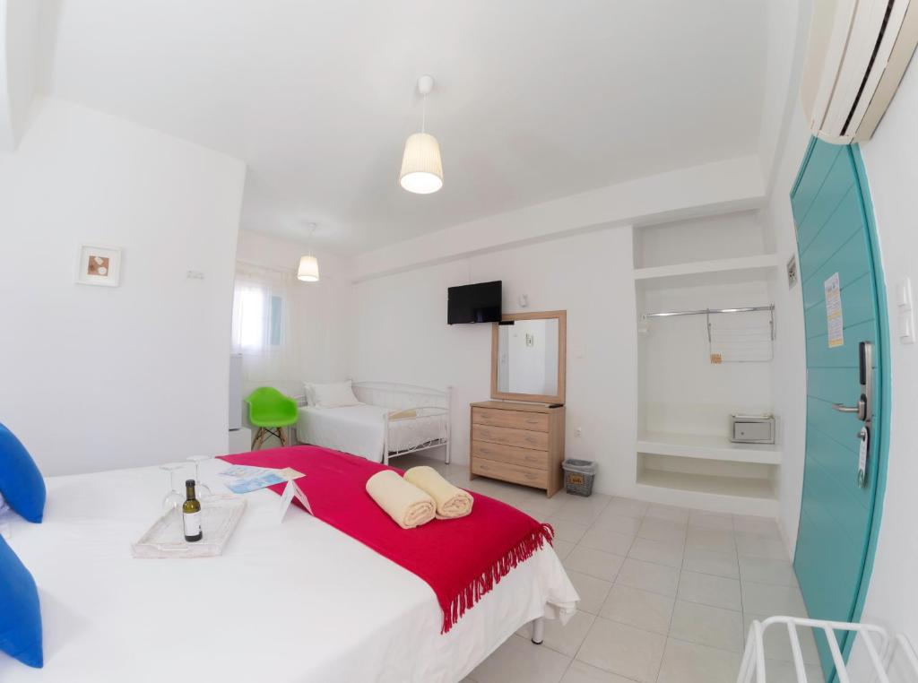 Postel nebo postele na pokoji v ubytování Amaryllis Beach Hotel
