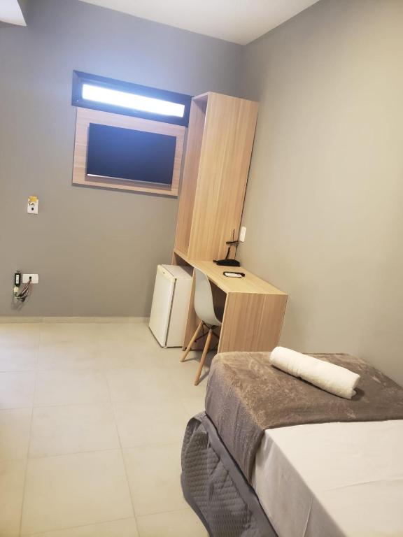 Letto o letti in una camera di Unity Hotel - Vila Mariana SP