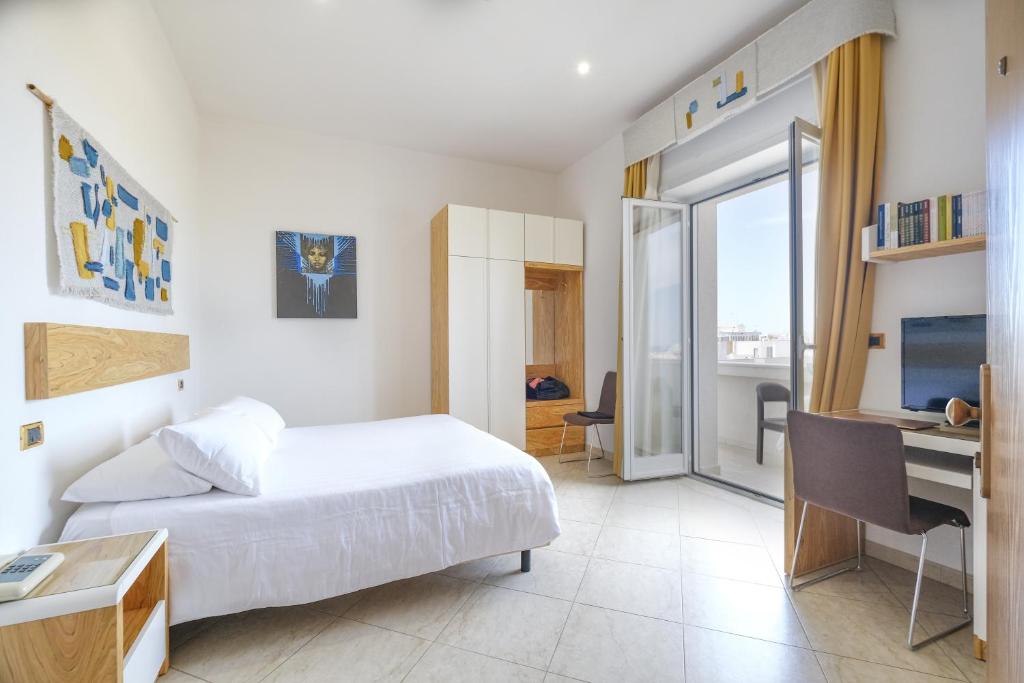 Postel nebo postele na pokoji v ubytování Joli Park Hotel - Caroli Hotels
