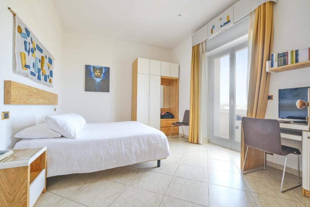 Postel nebo postele na pokoji v ubytování Joli Park Hotel - Caroli Hotels