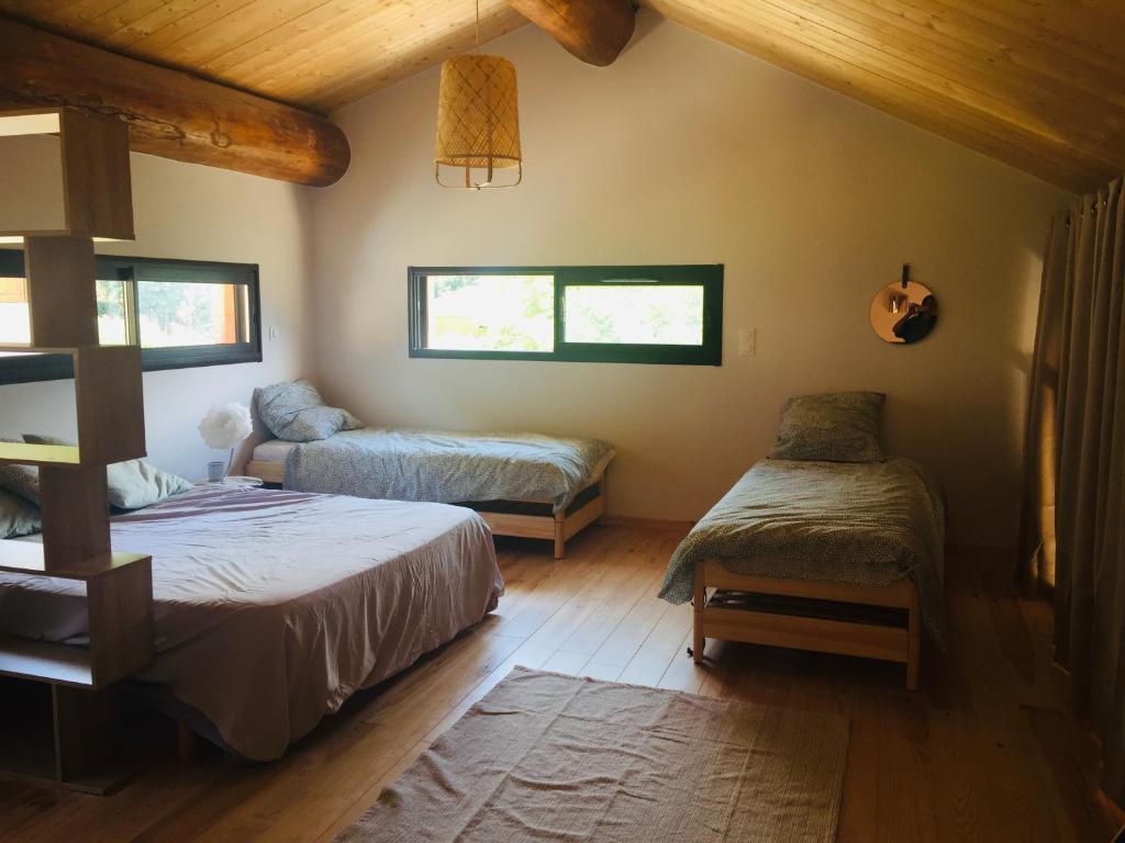 Postel nebo postele na pokoji v ubytování Spacieux logement Ax-les-thermes