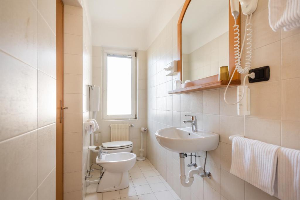 Koupelna v ubytování Hotel Lucia