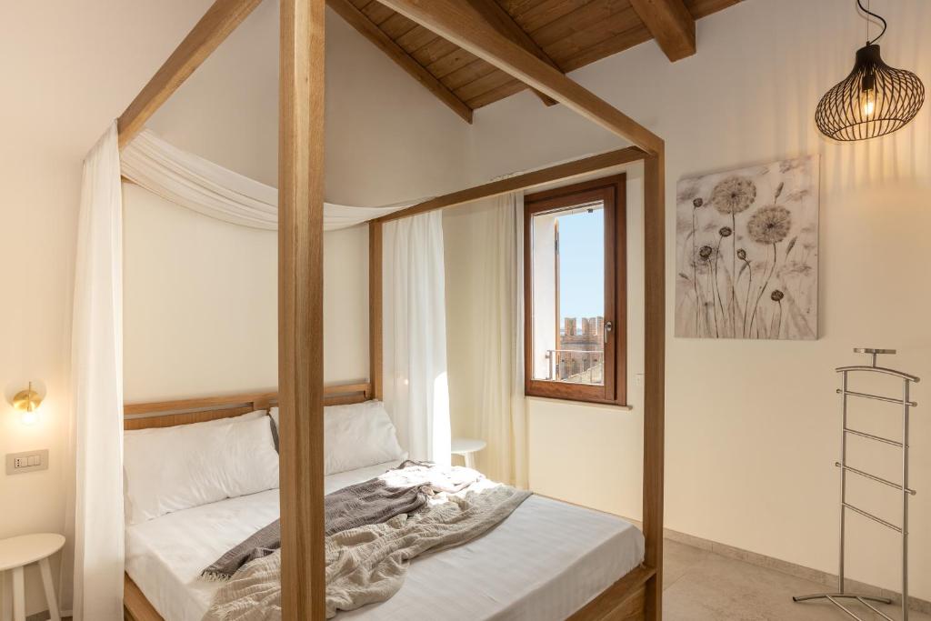 Katil atau katil-katil dalam bilik di Civiconove Affittacamere