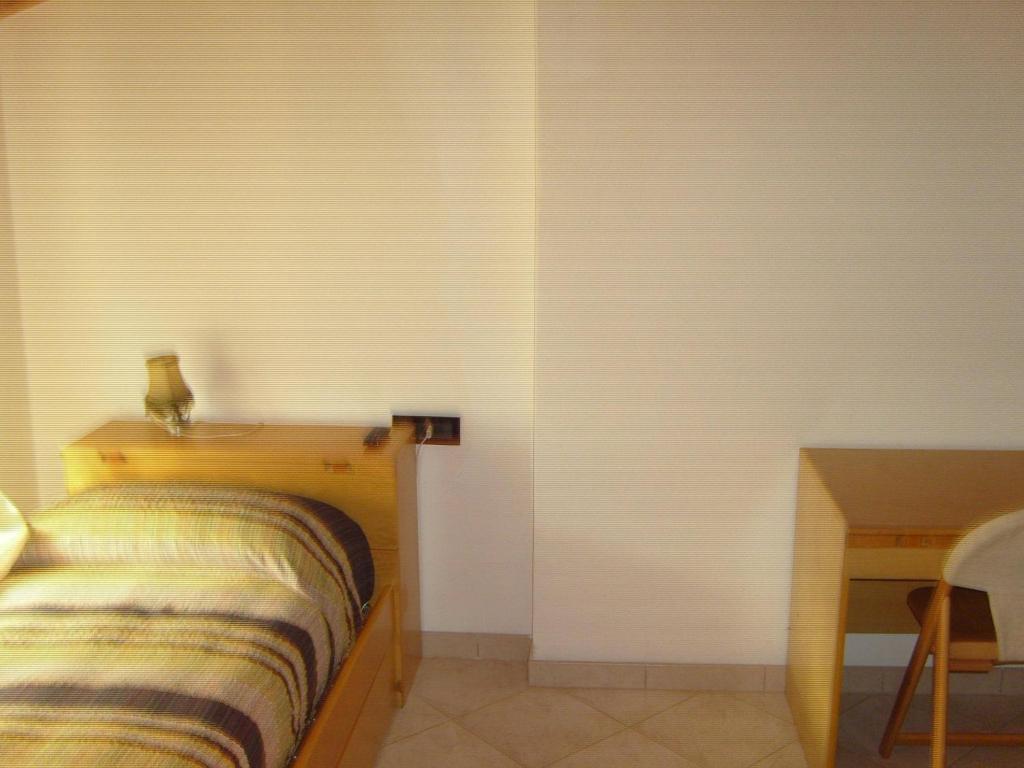 Voodi või voodid majutusasutuse Albergo Drena toas