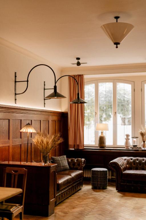 Postel nebo postele na pokoji v ubytování Hotel Fletzinger