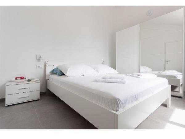 Un pat sau paturi &icirc;ntr-o camer&#x103; la Apartments Villa Dinga&#x10D;
