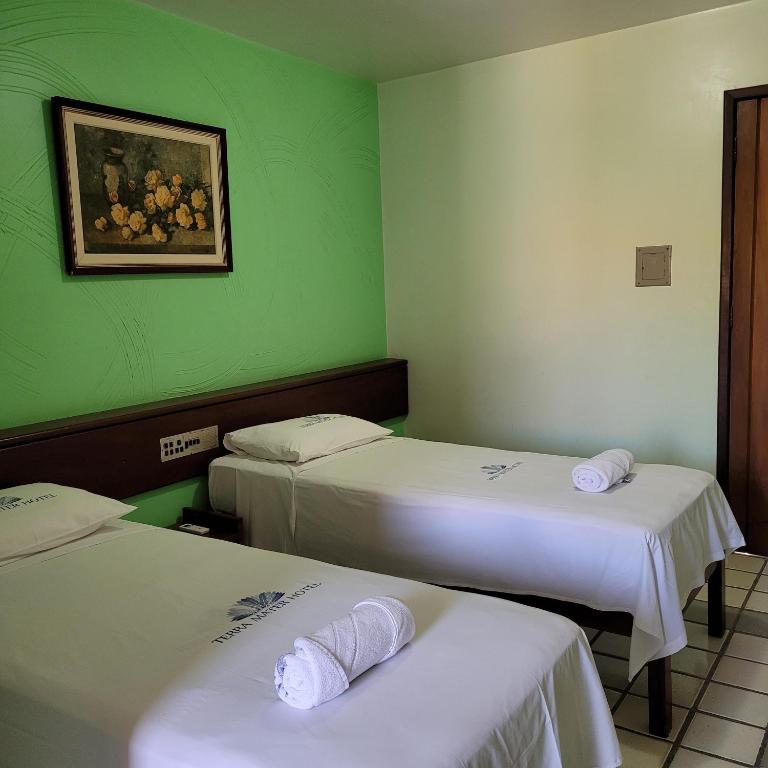 Postel nebo postele na pokoji v ubytování Hotel Terra Mater
