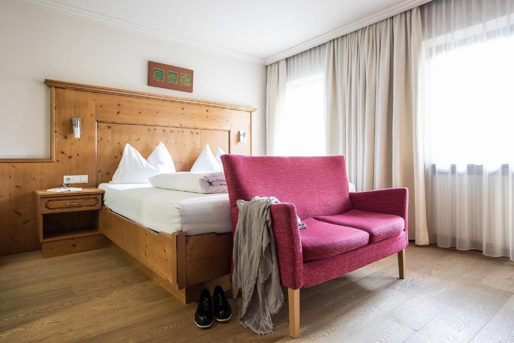 Letto o letti in una camera di Hotel Zum Hirschen
