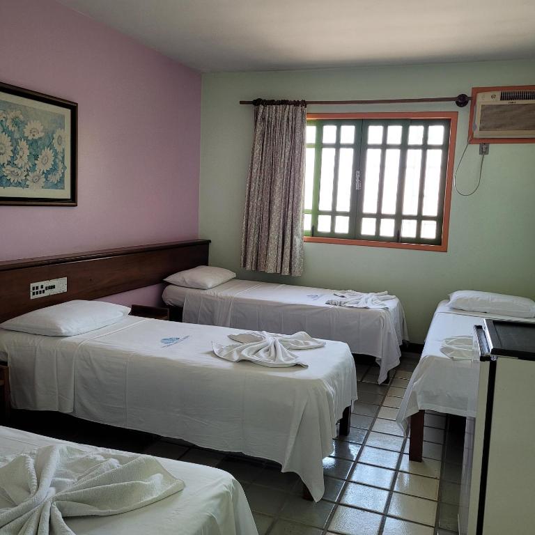 Postel nebo postele na pokoji v ubytování Hotel Terra Mater