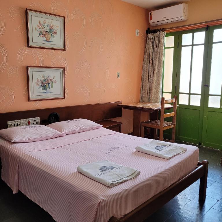 Postel nebo postele na pokoji v ubytování Hotel Terra Mater