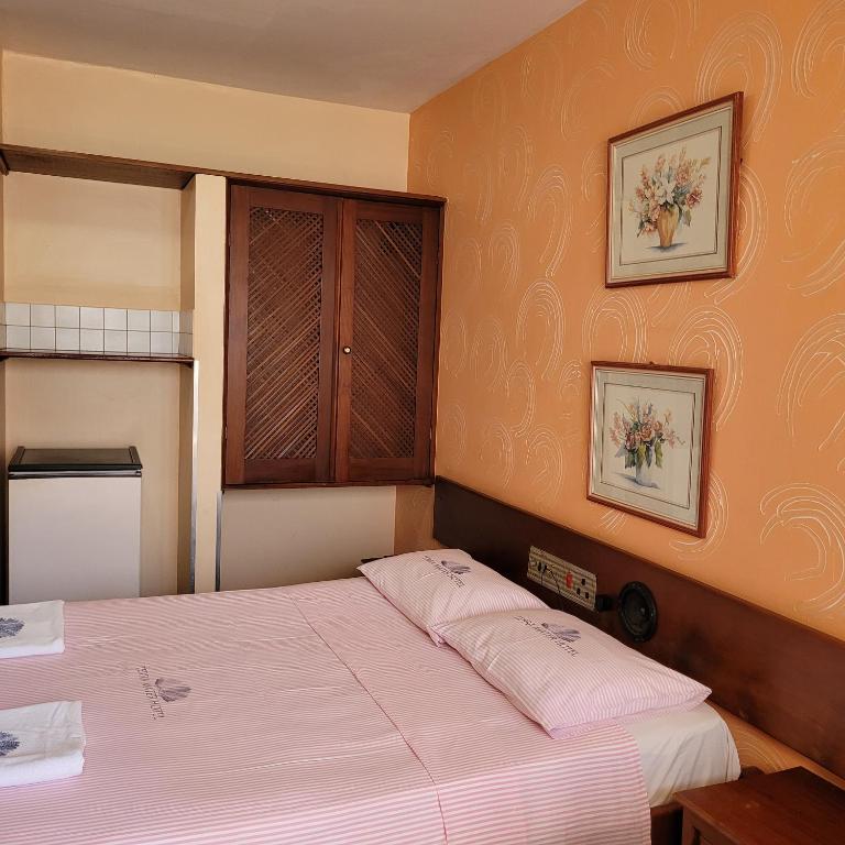 Postel nebo postele na pokoji v ubytování Hotel Terra Mater