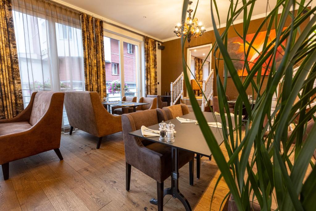Posezení v ubytování Home Hotel Arosa